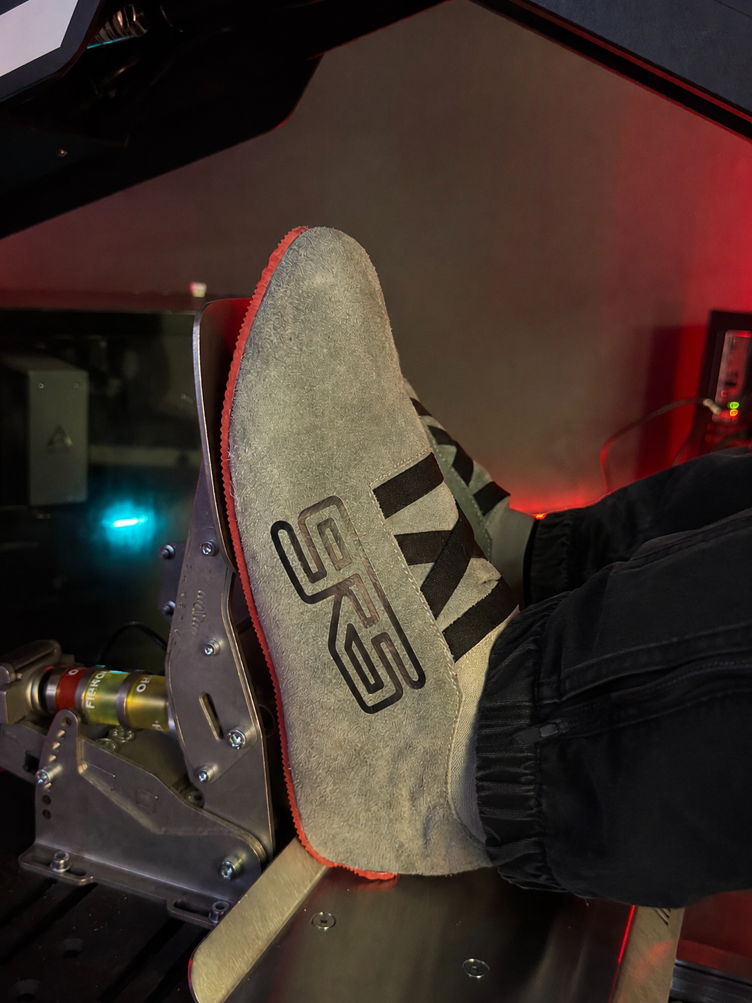 SRS Sim Racing Shoes in use on simulator pedals